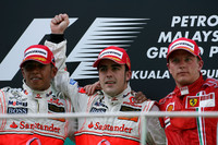 Alonso heads McLaren one-two in Malaysian GP Alonso heads McLaren one-two in Malaysian GP