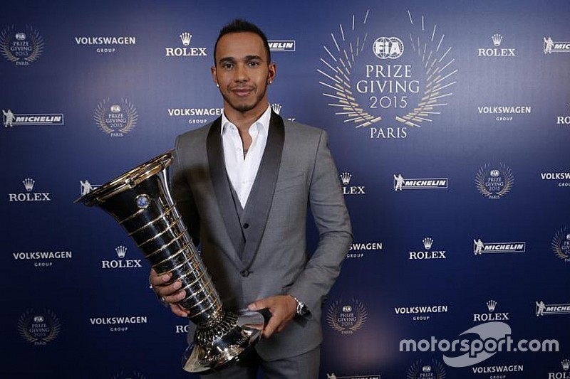 Hamilton collects F1 championship trophy at FIA Gala