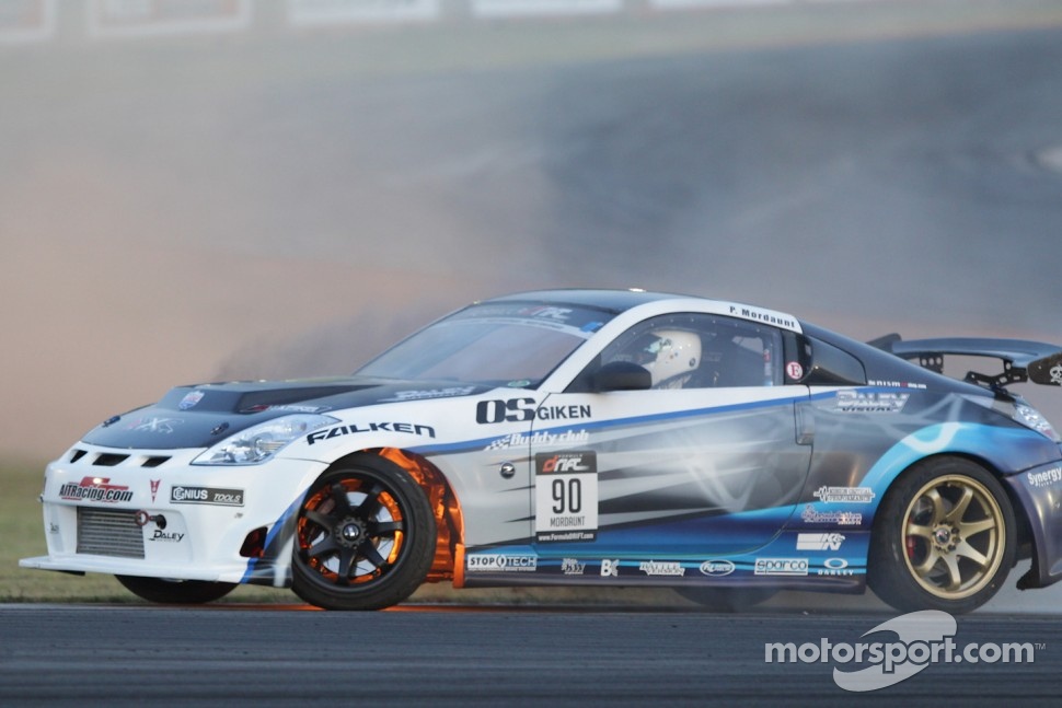 Patrick Mordaunt on fire after driving through the gravel