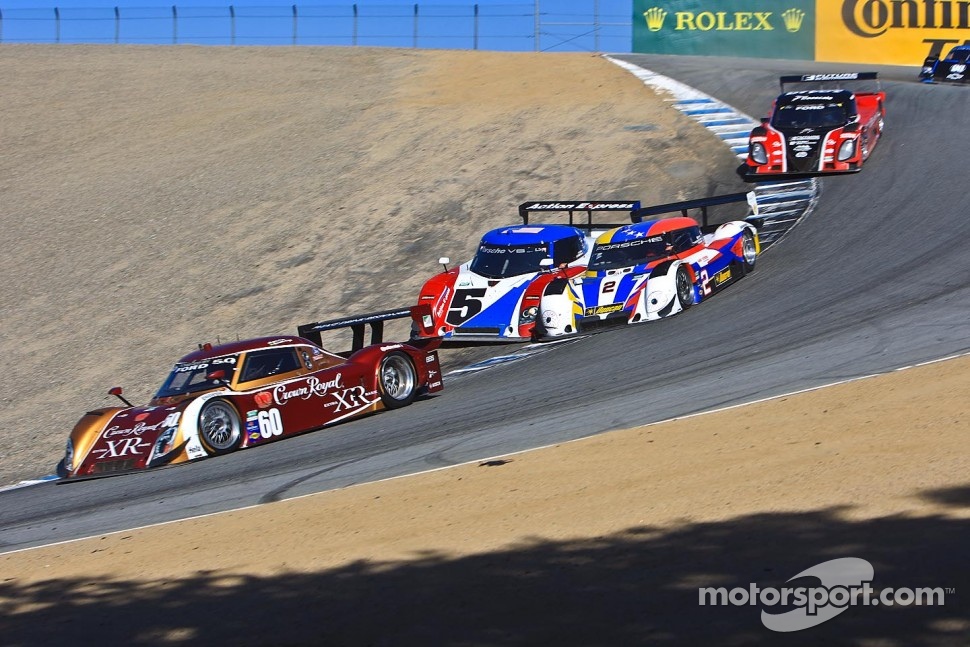 Taking the "Zanardi" line through the Corkscrew #5 Ryan Dalziel, Mike Forest, Alex Popow pushes #2 David Donohue; Darren Law off course