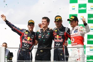 Podium: second place Sebastian Vettel, Red Bull Racing, race winner Mark Webber, Red Bull Racing and third place Jenson Button, McLaren Mercedes