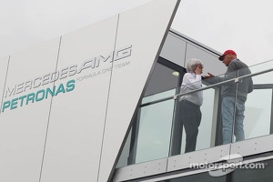 (L to R): Bernie Ecclestone, CEO Formula One Group, talks with Niki Lauda, Mercedes Non-Executive Chairman on the Mercedes AMG F1 motorhome roof