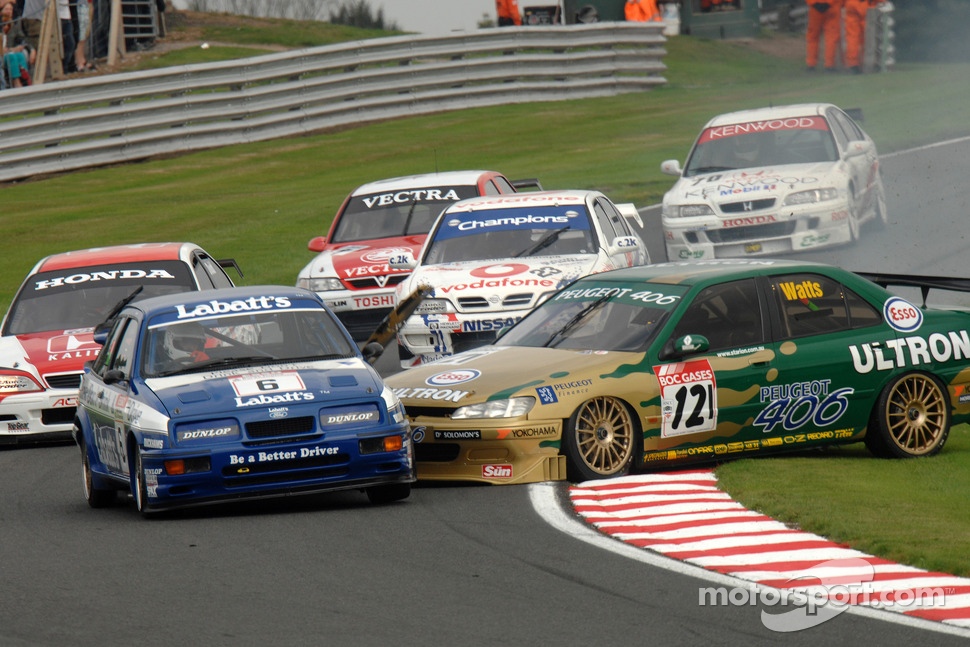 Patrick Watts, Peugeot 406 and Paul Smith Ford Sierra RS500 collide heading down Cascades