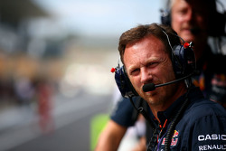Red Bull Racing Team Principal Christian Horner looks on from the pit wall