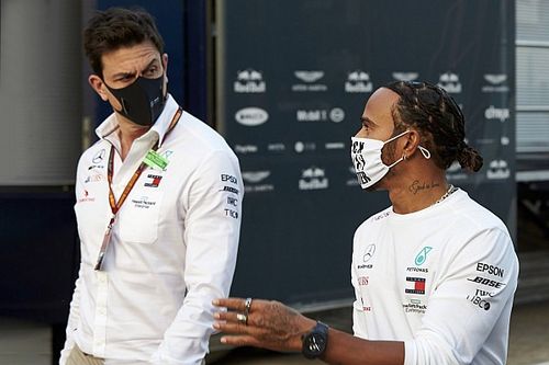 Wolff says "curveballs" delaying Hamilton's new contract