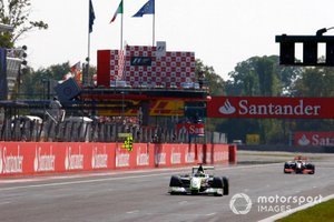 Jenson Button, Brawn GP BGP001 Mercedes, Lewis Hamilton, McLaren MP4-24 Mercedes