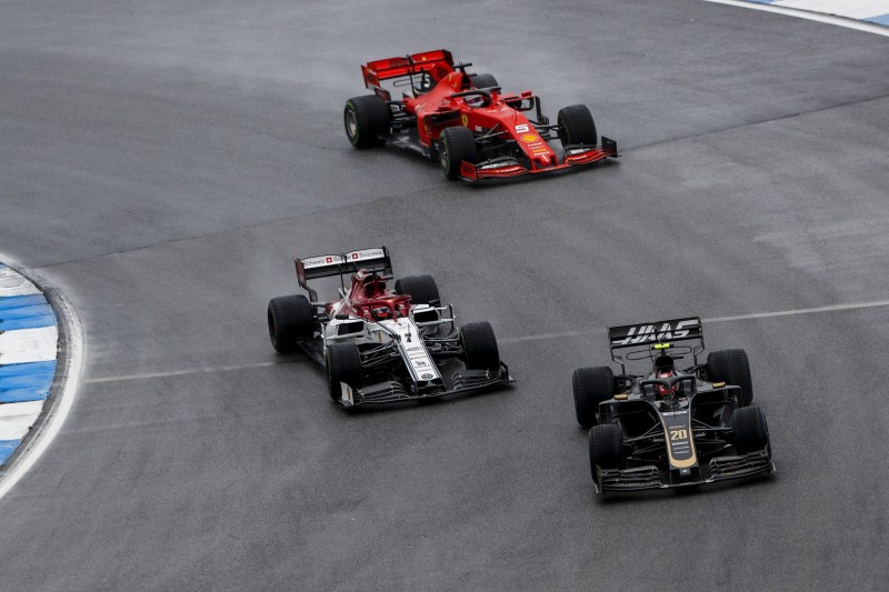 Kevin Magnussen, Kimi Räikkönen, Sebastian Vettel