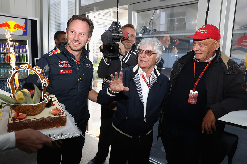 F1 supremo Bernie Ecclestone is presented with a birthday cake by Christian Horner, Red Bull Racing Team Principal, Niki Lauda, Mercedes GP non-executive chairman also attends