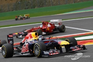 Vettel with Alonso’s Ferrari behind him