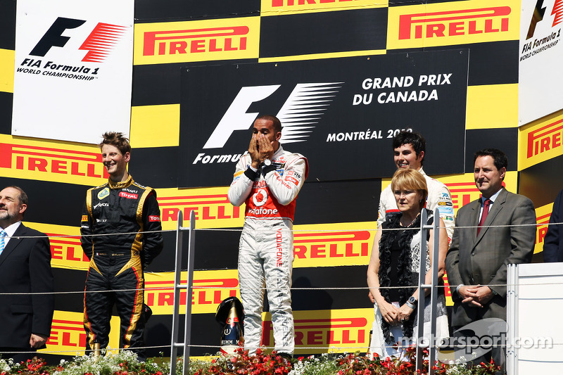 [Resim: f1-canadian-gp-2012-the-podium-romain-gr...claren.jpg]