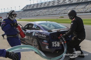 Pit stop for #158 Dempsey Racing Mustang Boss 302R: Ian James, Roger Miller 