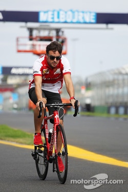 Fernando Alonso, Ferrari rides the circuit on his bicycle