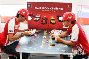 (L to R): Pedro De La Rosa, Ferrari Development Driver and Fernando Alonso, Ferrari play the Ferrari Shell Lego Challenge