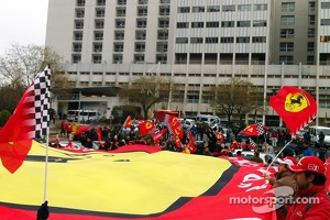 Ferrari fans show support for Michael Schumacher in front of the Grenoble University Hospital following his ski accident