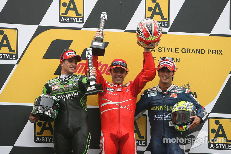 Winner Loris Capirossi with Randy de Puniet and Toni Elias on the podium